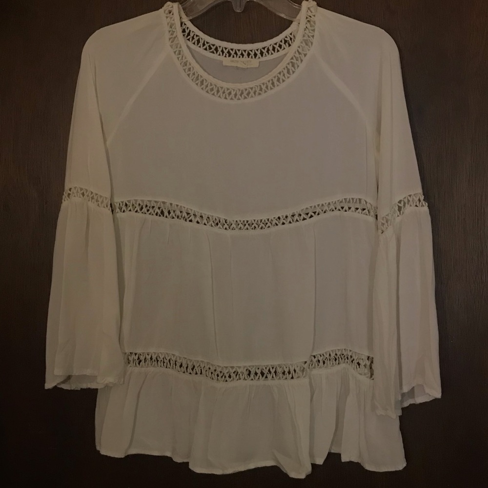 White flowy small haute society blouse